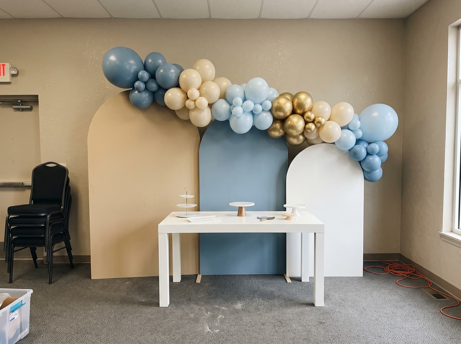 Chiara arched backdrop trio with a balloon garland