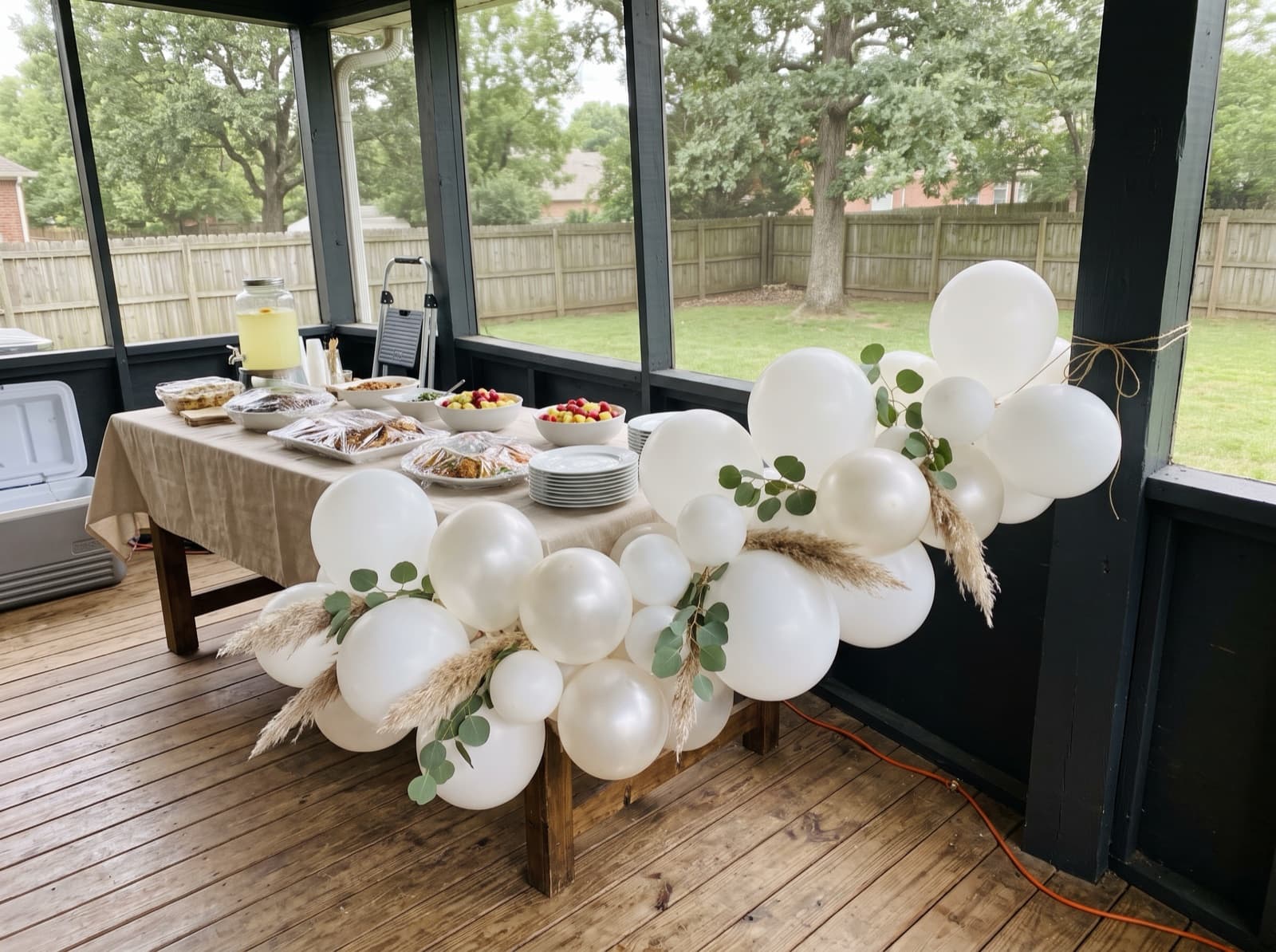 Ivory and pearl balloon garland with eucalyptus and pampas